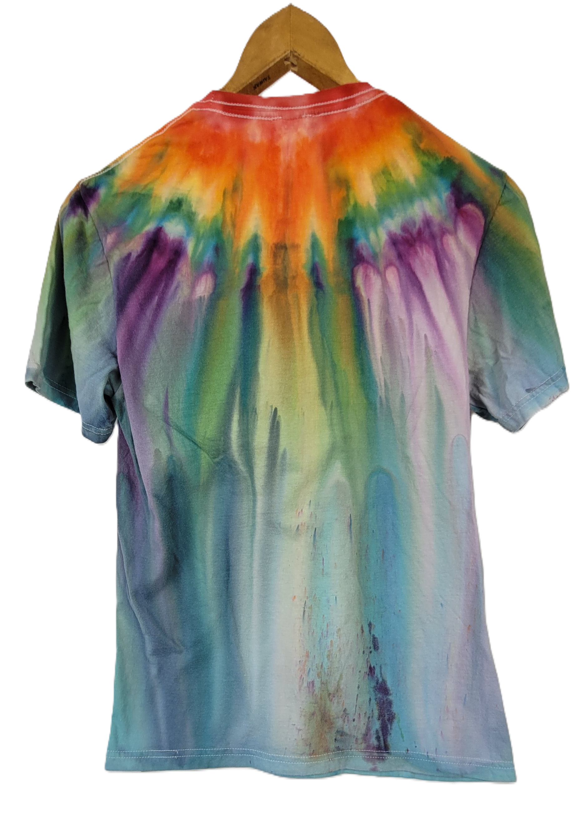 Tie-dye t-shirt on a hanger with a white background
