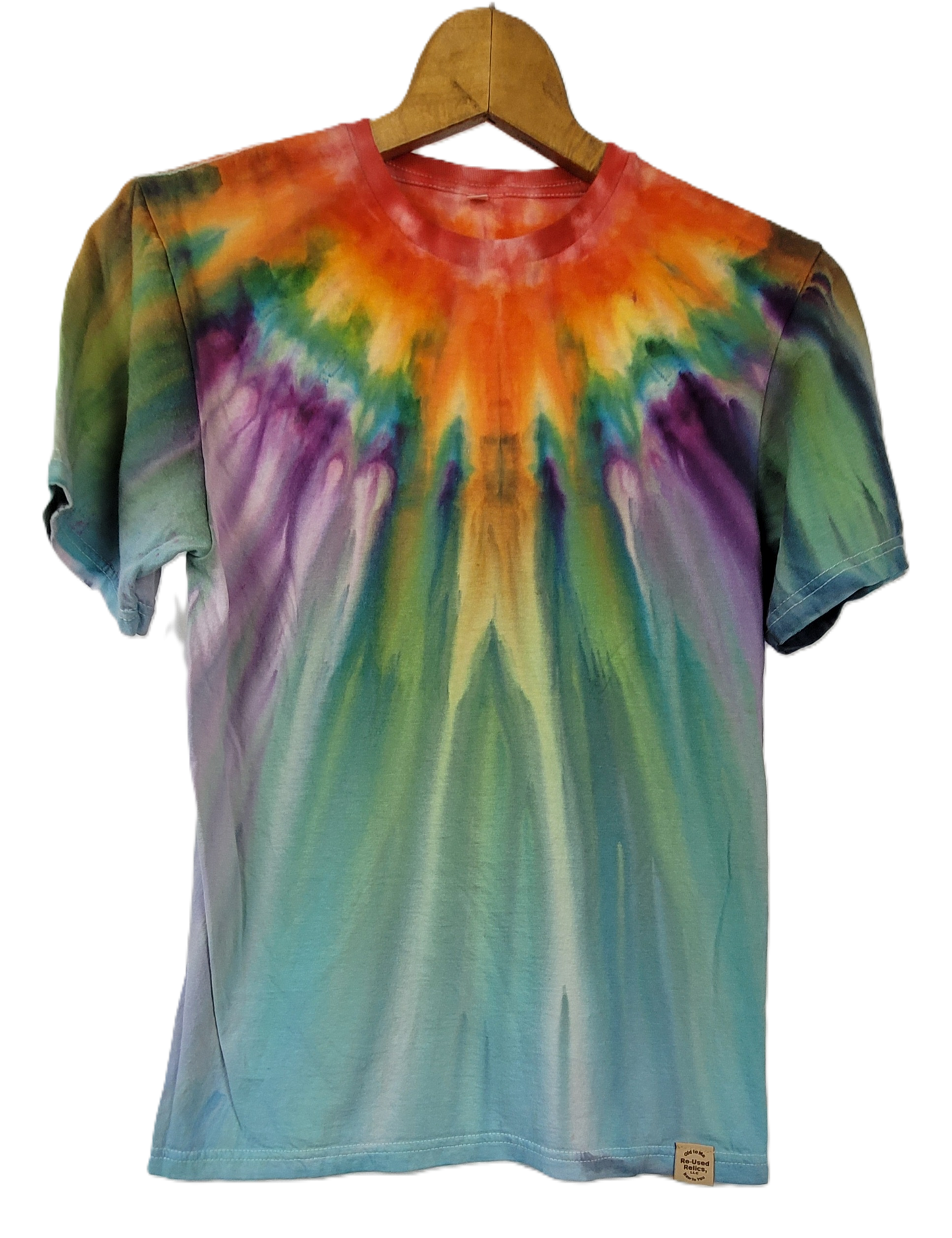 Colorful tie-dye t-shirt on a wooden hanger against a white background
