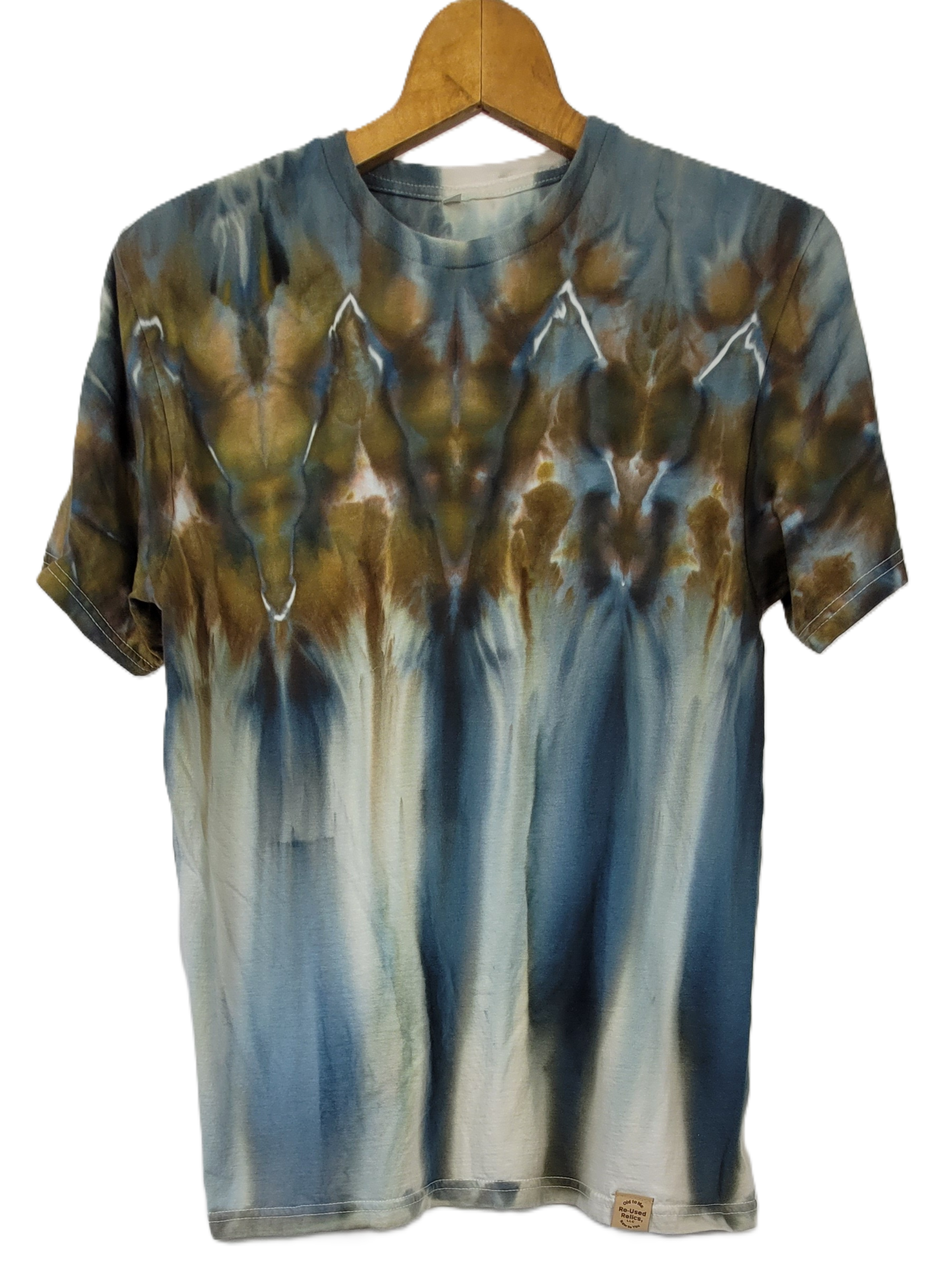 Tie-dye t-shirt on a wooden hanger with a white background