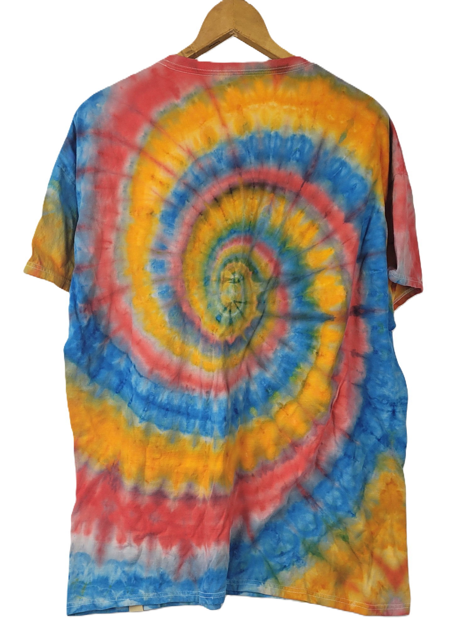 Tie-dye t-shirt with a spiral pattern on a hanger against a white background