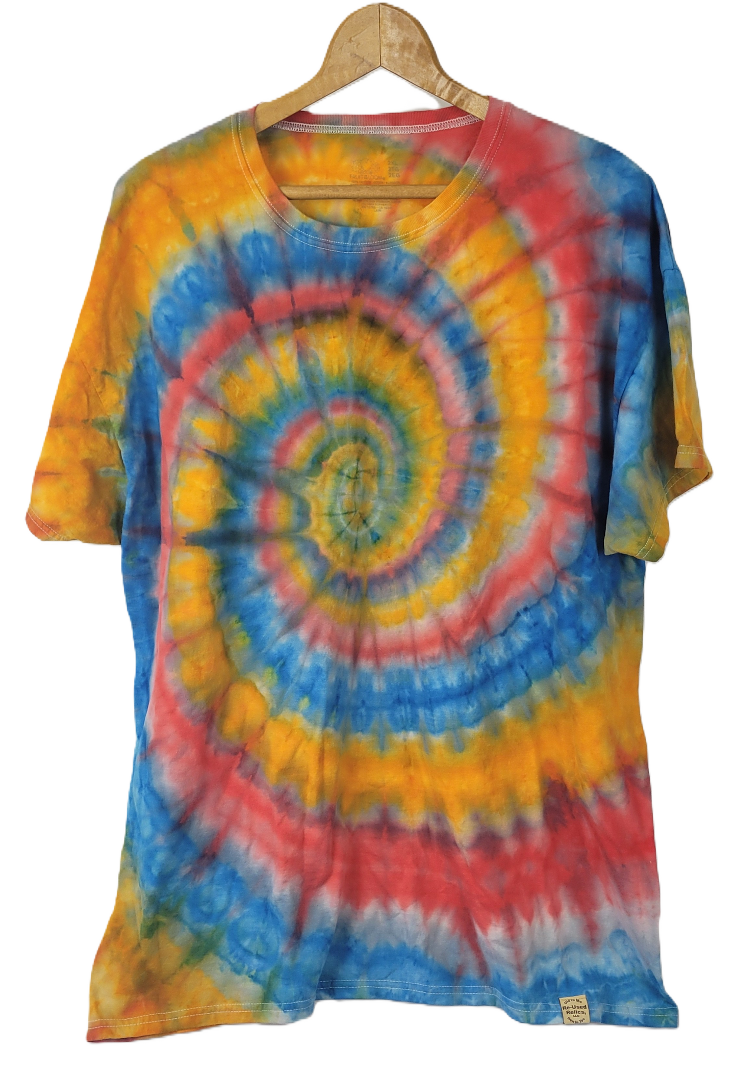 Colorful tie-dye t-shirt on a hanger with a white background