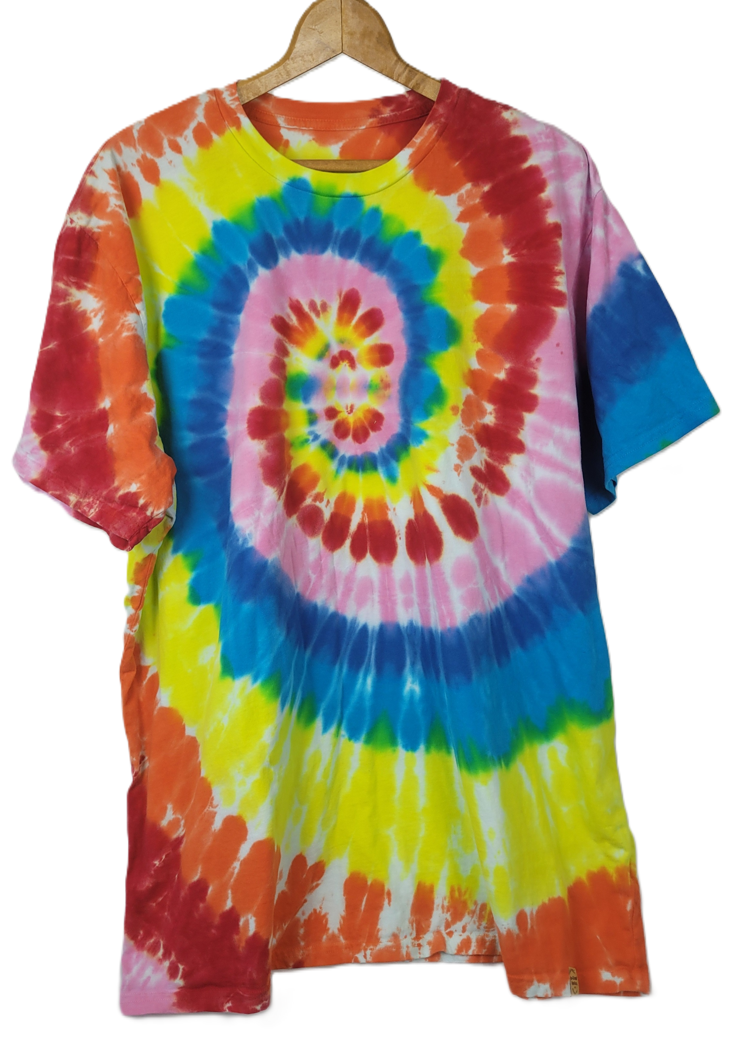 Colorful tie-dye t-shirt on a hanger with a white background