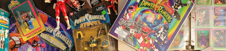 Collection of Power Rangers toys and memorabilia on a table