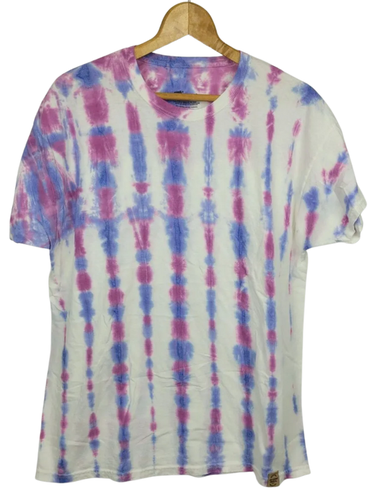 Tie-dye t-shirt with pink and blue patterns on a wooden hanger