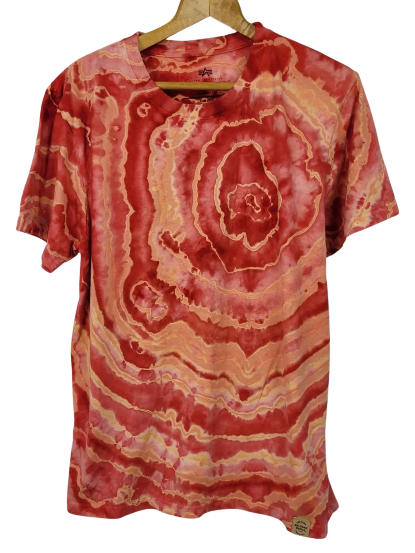 Red and orange tie-dye t-shirt on a hanger against a white background