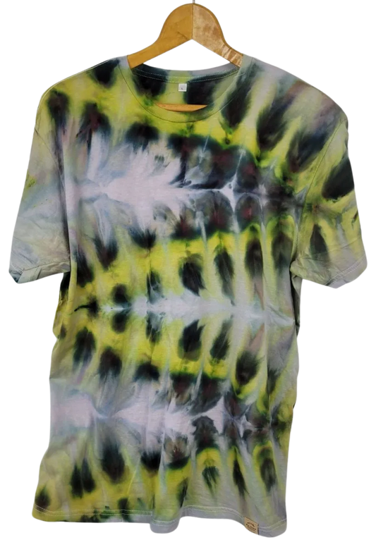 Tie-dye t-shirt on a wooden hanger with a white background