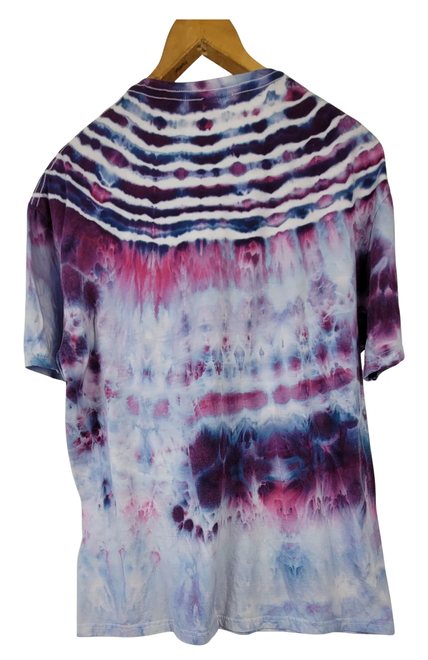 Tie-dye shirt on a hanger with a white background