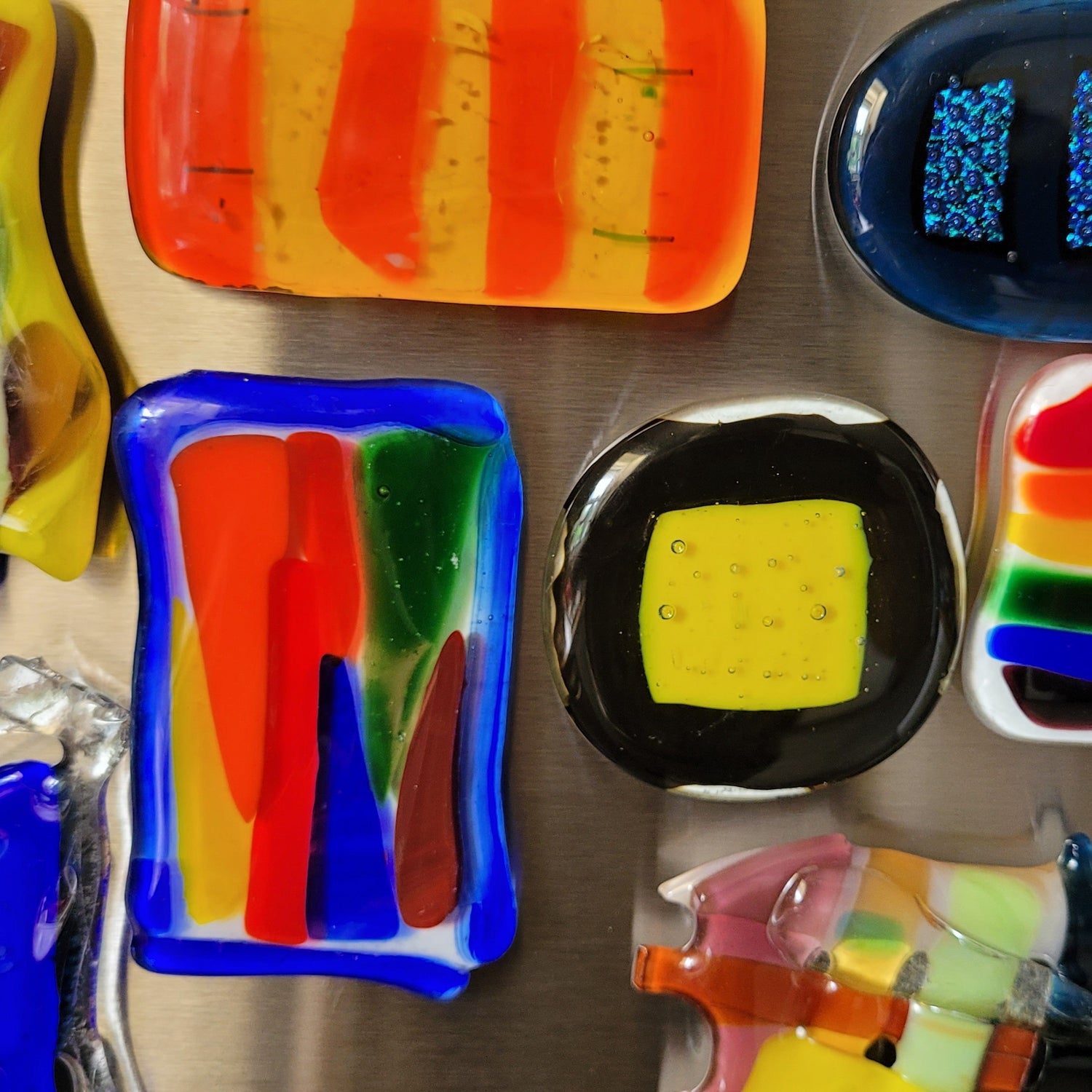 color fused glass refrigerator magnets on stainless steel