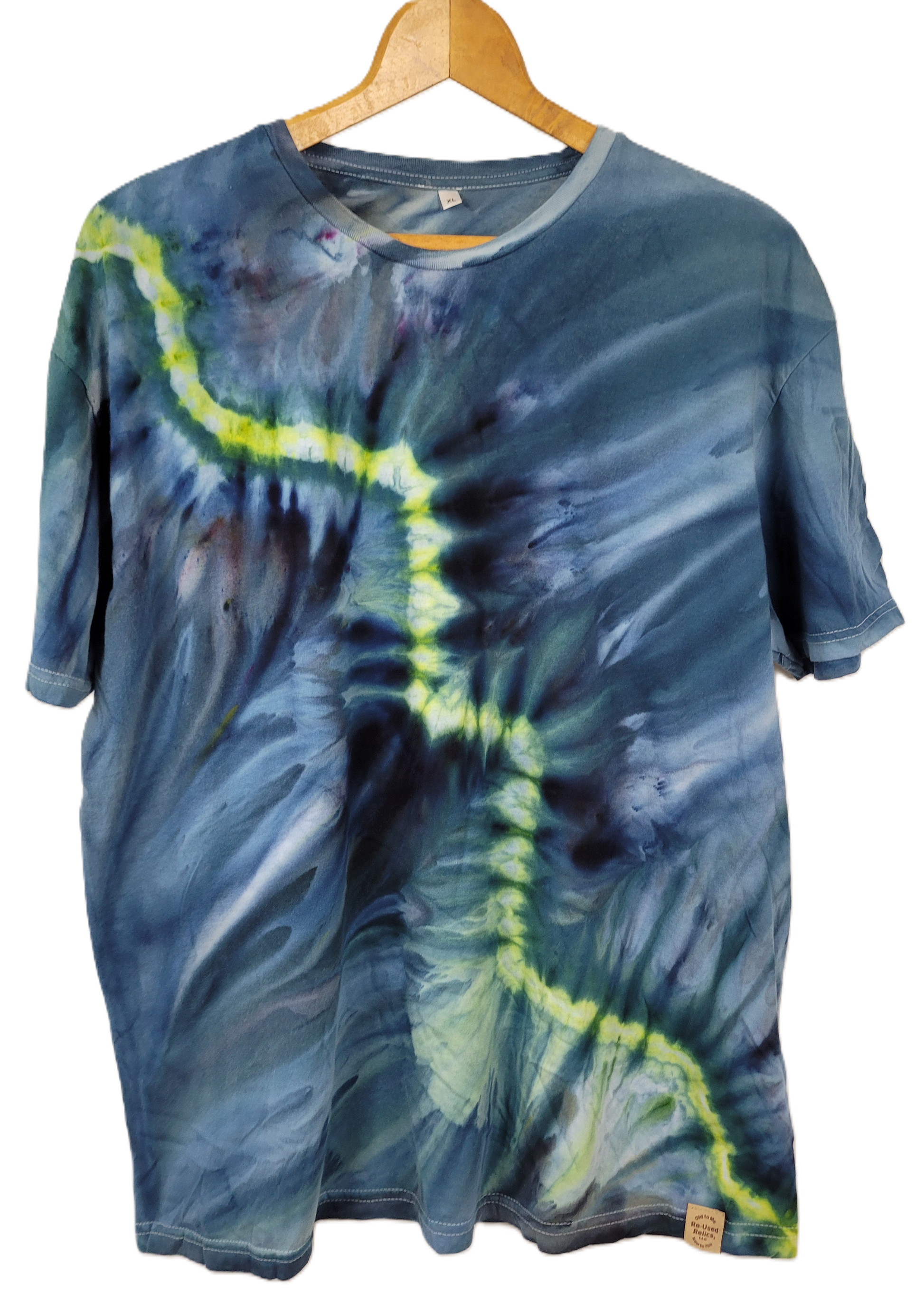 Tie-dye t-shirt with blue and green patterns on a white background