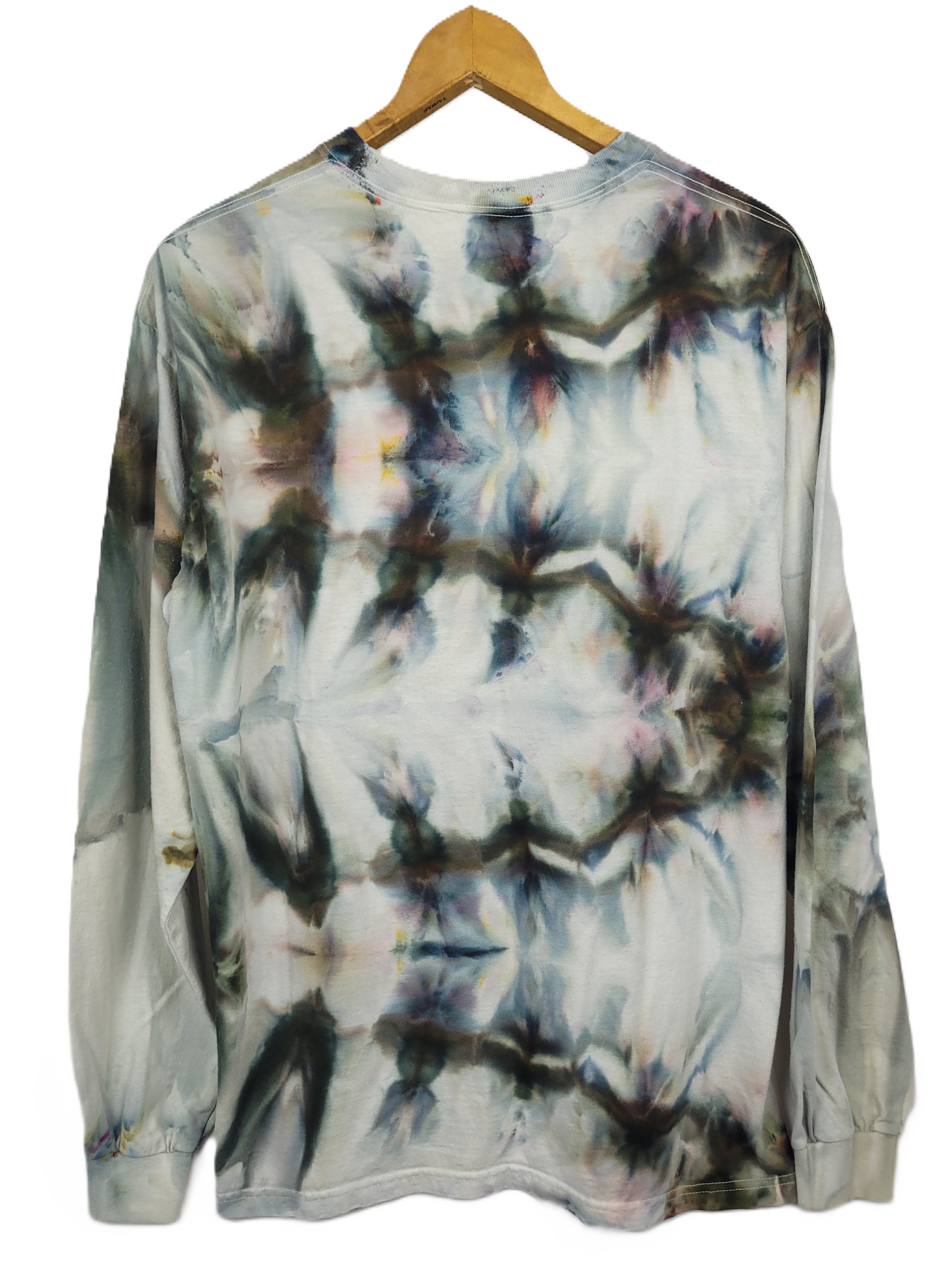 Tie-dye long-sleeve shirt on a wooden hanger with a white background