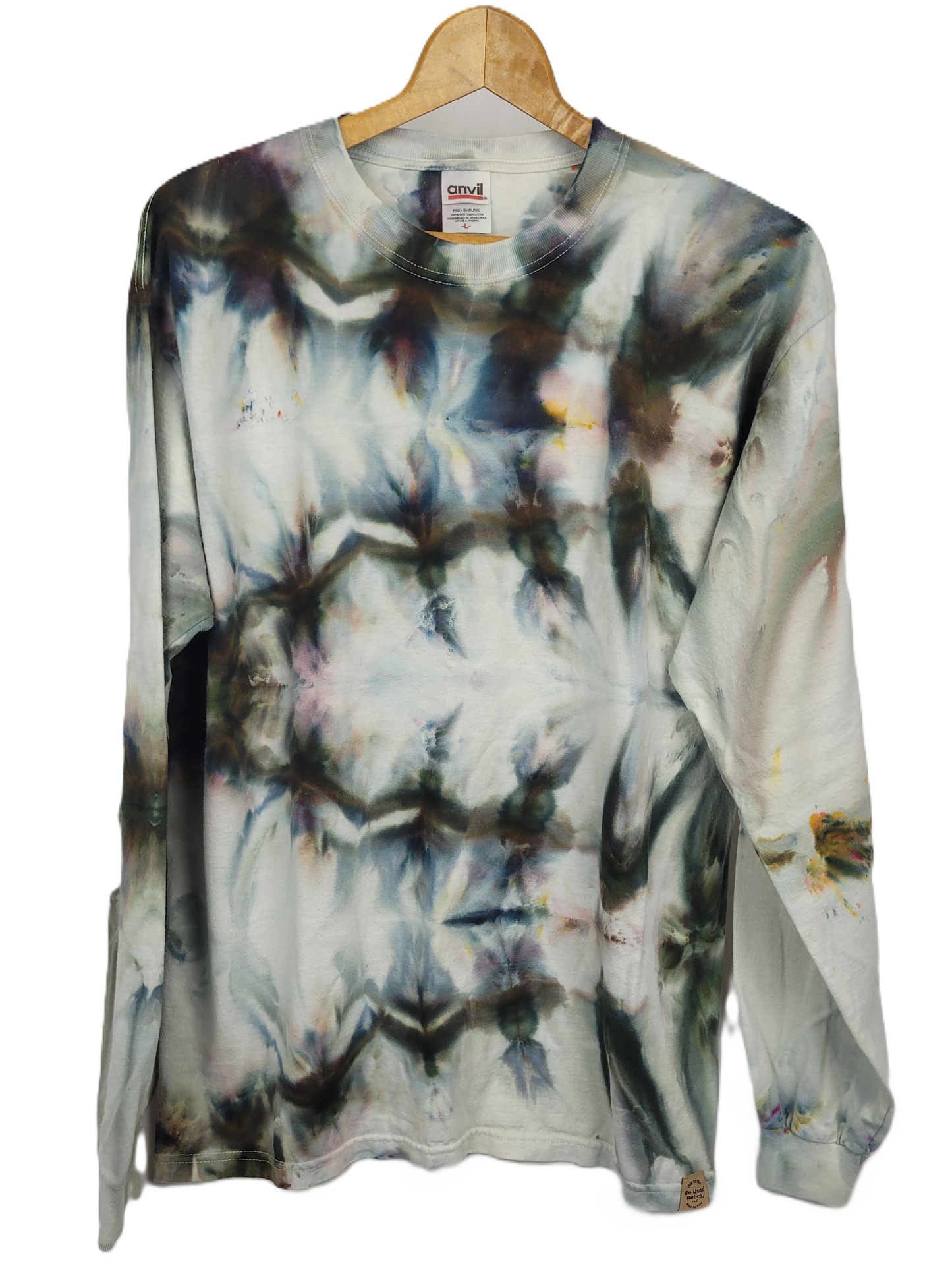 Tie-dye long-sleeve shirt on a hanger with a visible brand label.