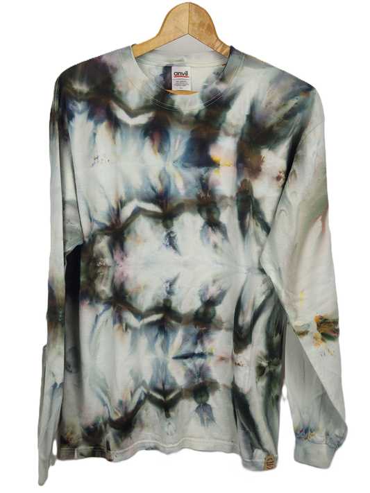 Tie-dye long-sleeve shirt on a hanger with a visible brand label.