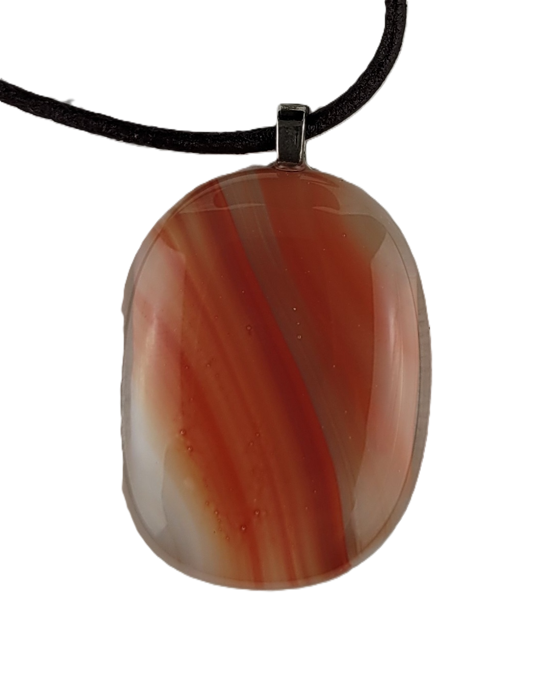 Oval-shaped fused glass pendant on a black cord against a white background