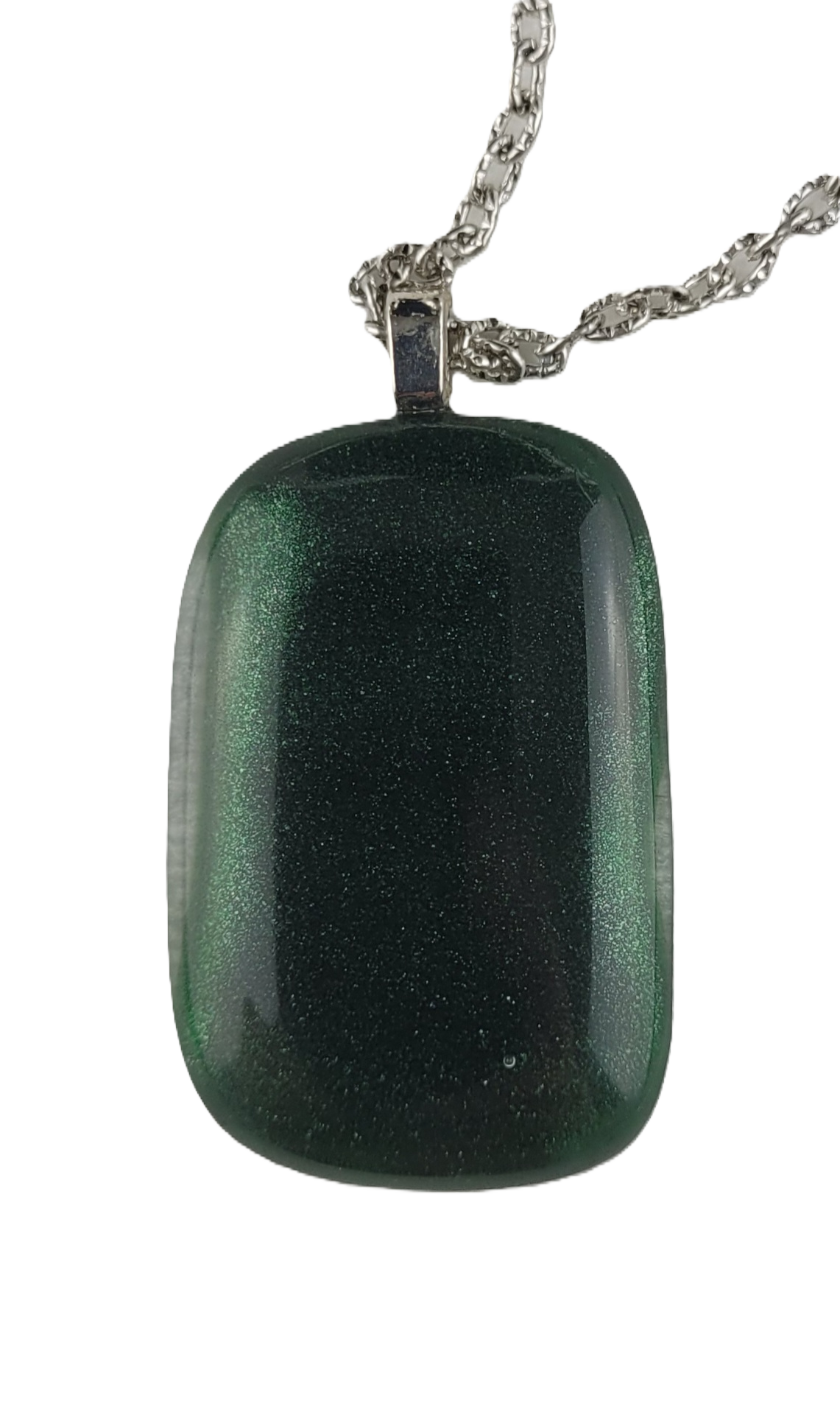 Green glass pendant on a chain against a white background