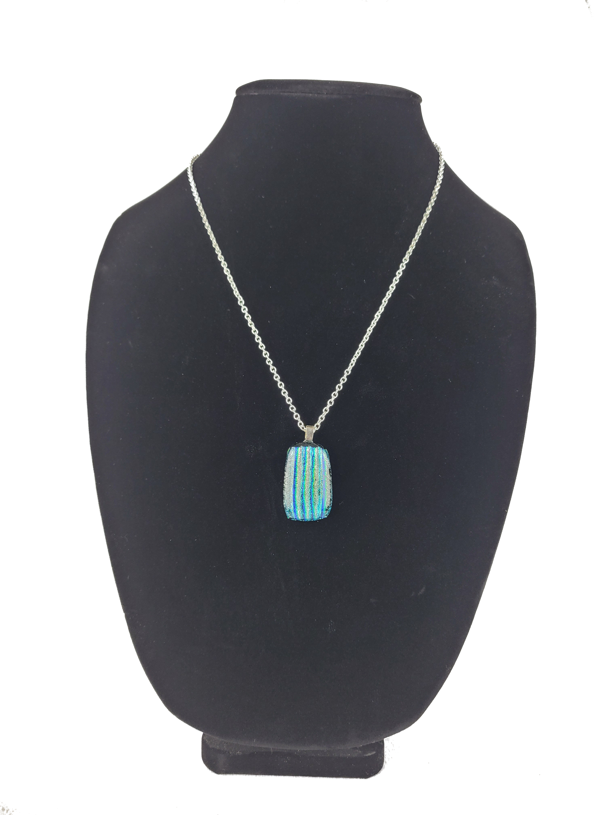 Necklace with a blue pendant on a black bust