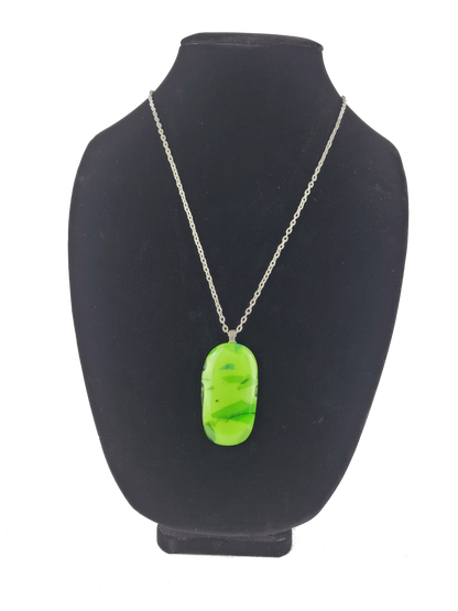 Neon green pendant necklace on a black mannequin bust