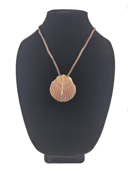 Shell pendant necklace on a black mannequin bust