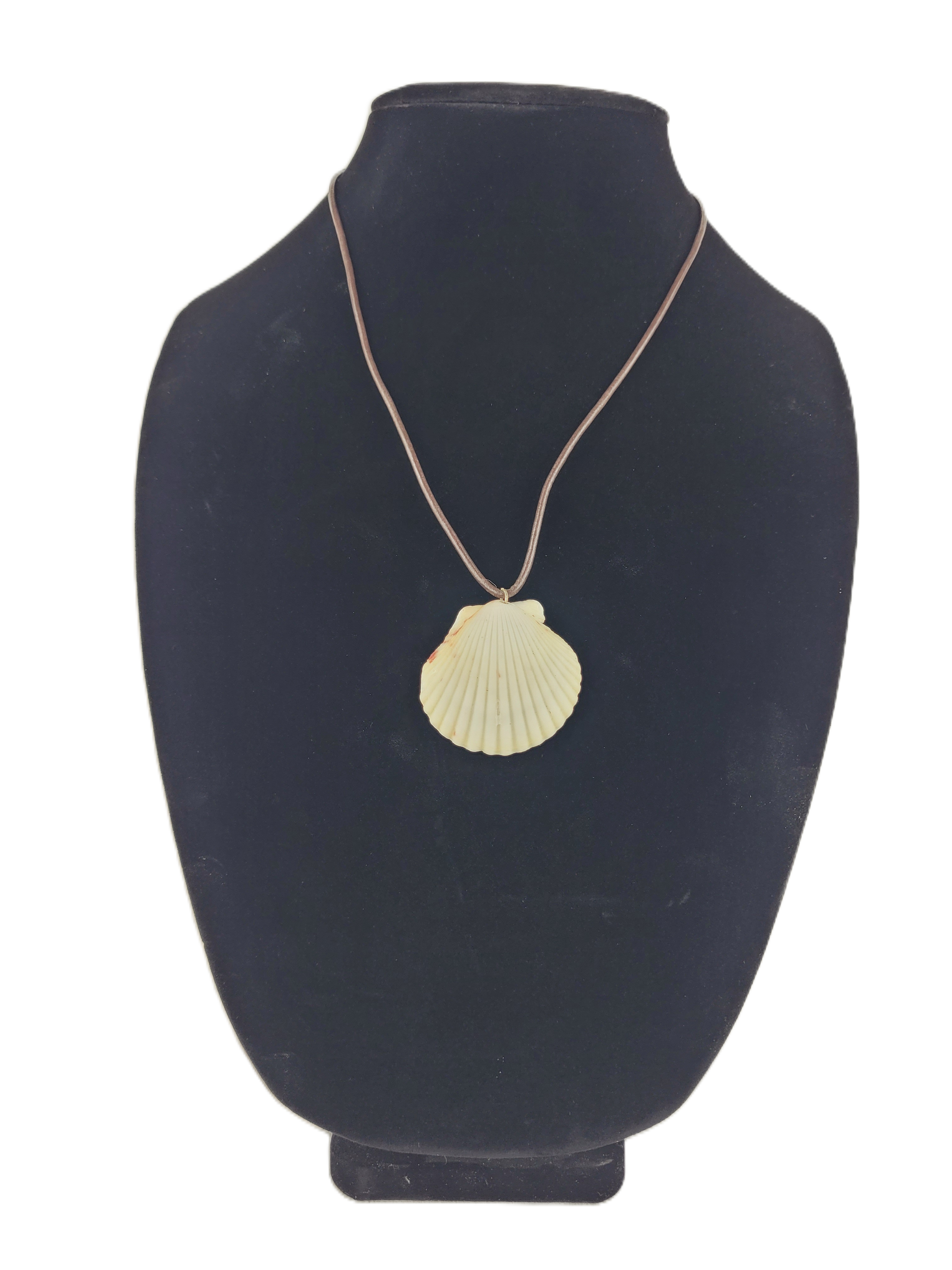 Shell pendant necklace on a black mannequin bust