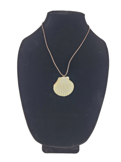 Shell pendant necklace on a black mannequin bust
