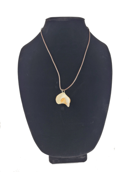 Necklace with a pendant on a black mannequin bust against a white background