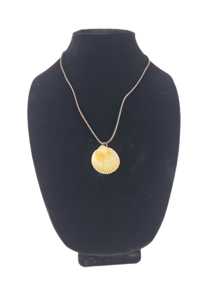 Necklace with a shell pendant on a black mannequin bust against a white background