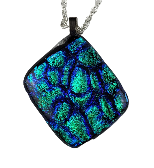 Necklace with a square, multicolored pendant on a white background