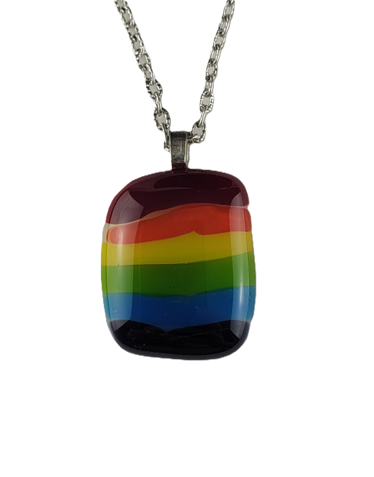 Rainbow pendant necklace on a white background