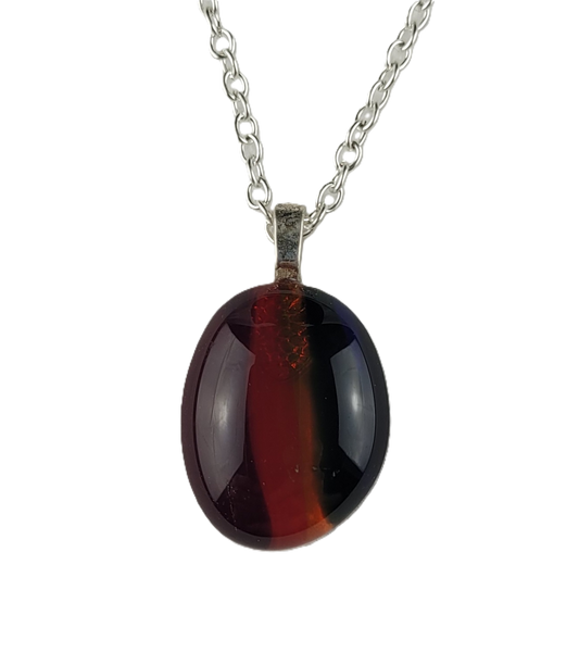Necklace with a red oval pendant on a white background