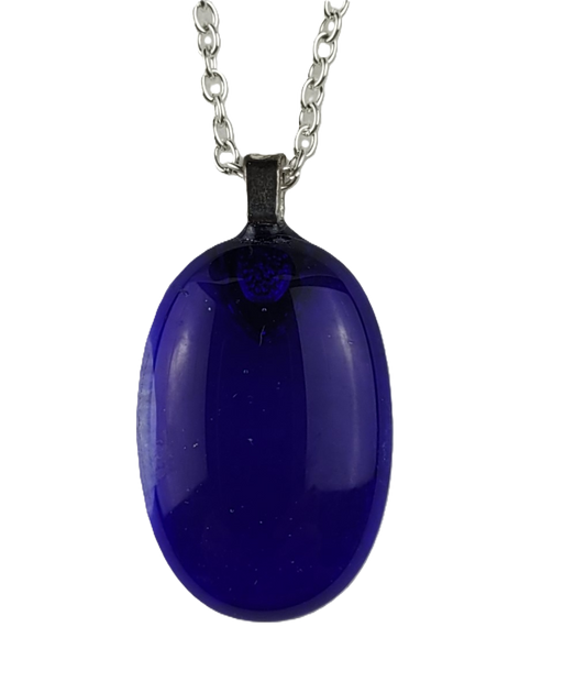 Blue pendant on a silver chain against a white background