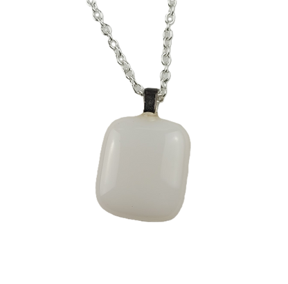 Necklace with a white pendant on a white background