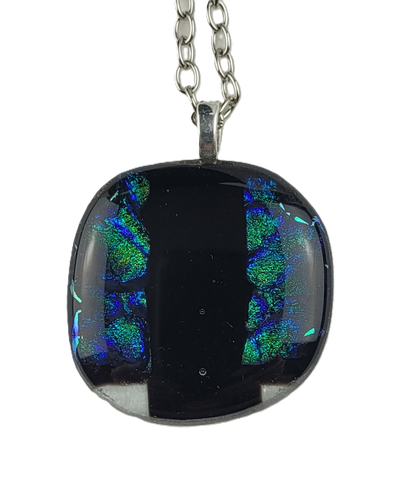 Necklace with a round pendant featuring black and blue colors on a white background