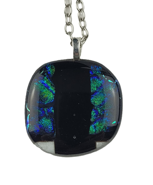 Necklace with a round pendant featuring black and blue colors on a white background