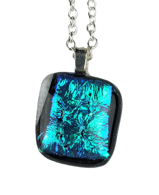 Necklace with a square pendant featuring blue and black colors on a white background