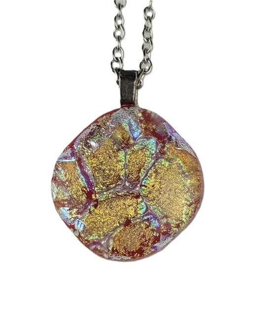 Round multicolored pendant on a chain against a white background