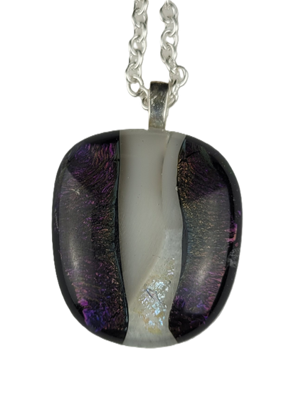 Necklace with a multicolored pendant on a white background