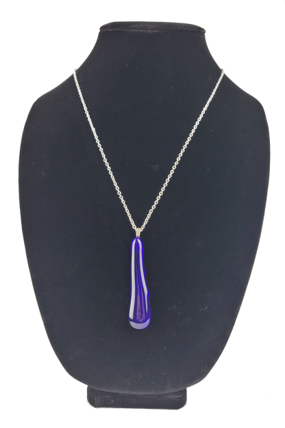 Necklace with a blue pendant on a black mannequin bust