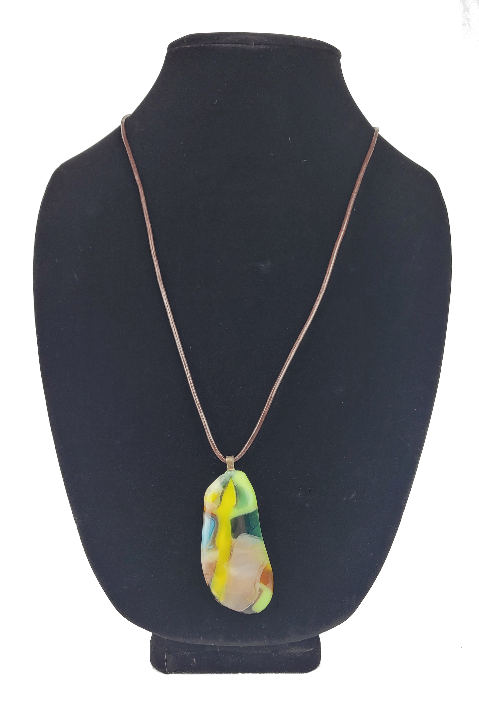Necklace with a colorful pendant on a black mannequin bust