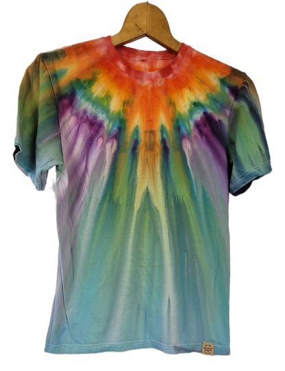 Colorful tie-dye t-shirt on a wooden hanger against a white background