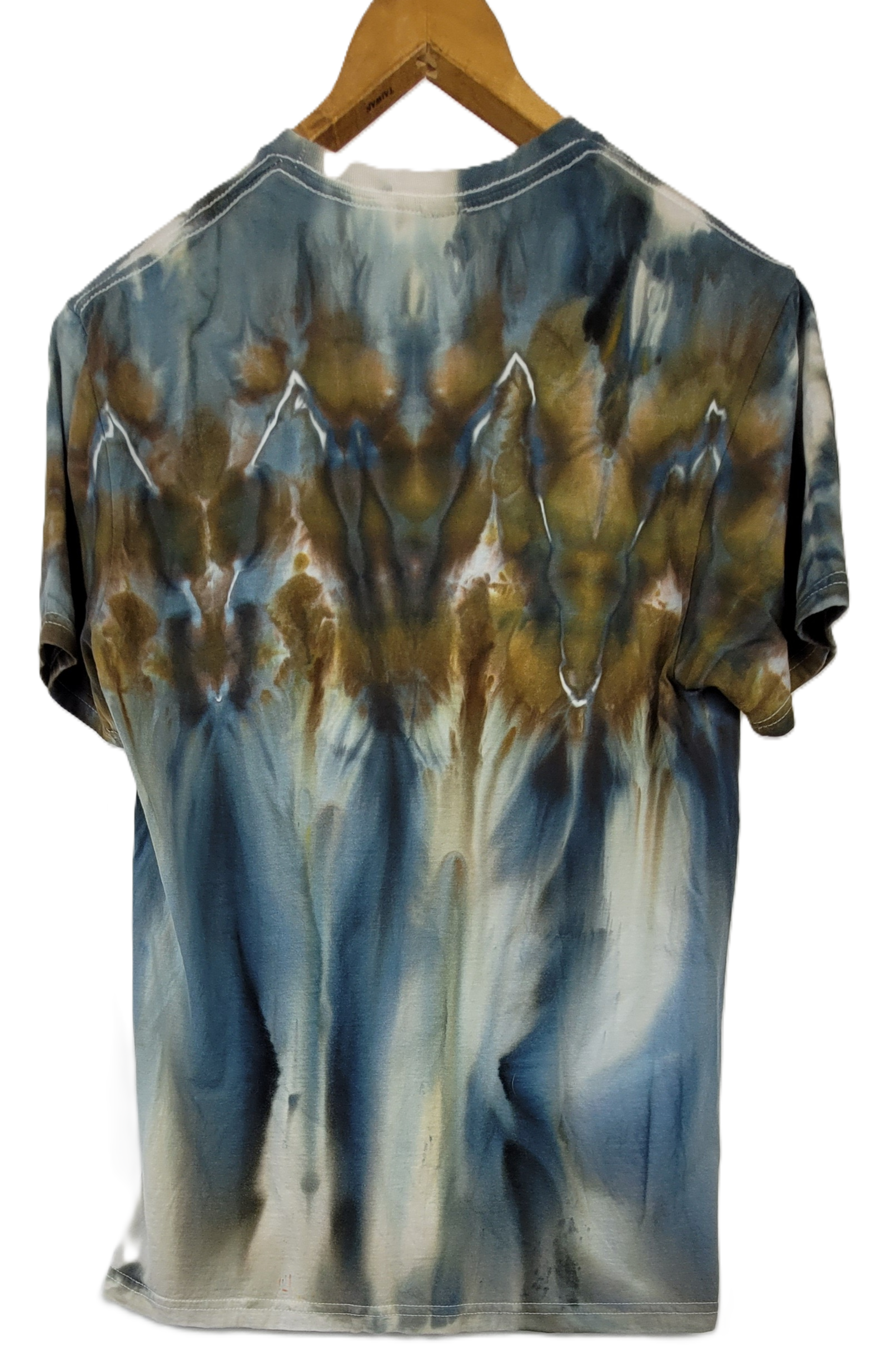 Tie-dye t-shirt on a wooden hanger with a white background