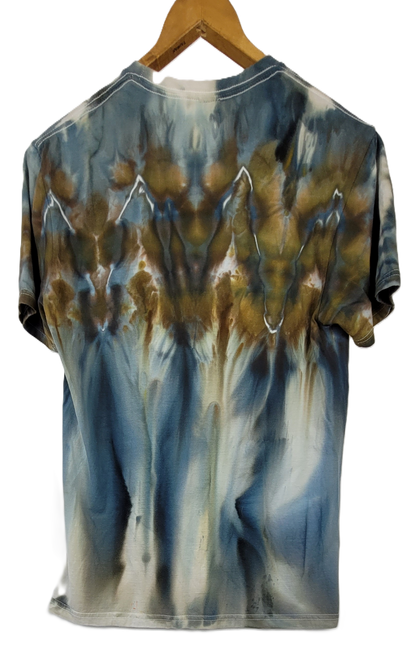 Tie-dye t-shirt on a wooden hanger with a white background