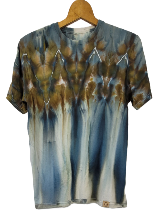 Tie-dye t-shirt on a wooden hanger with a white background