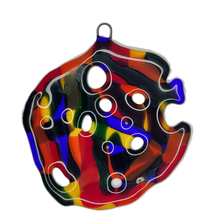 Colorful puzzle piece-shaped ornament on a white background