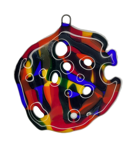 Colorful puzzle piece-shaped ornament on a white background