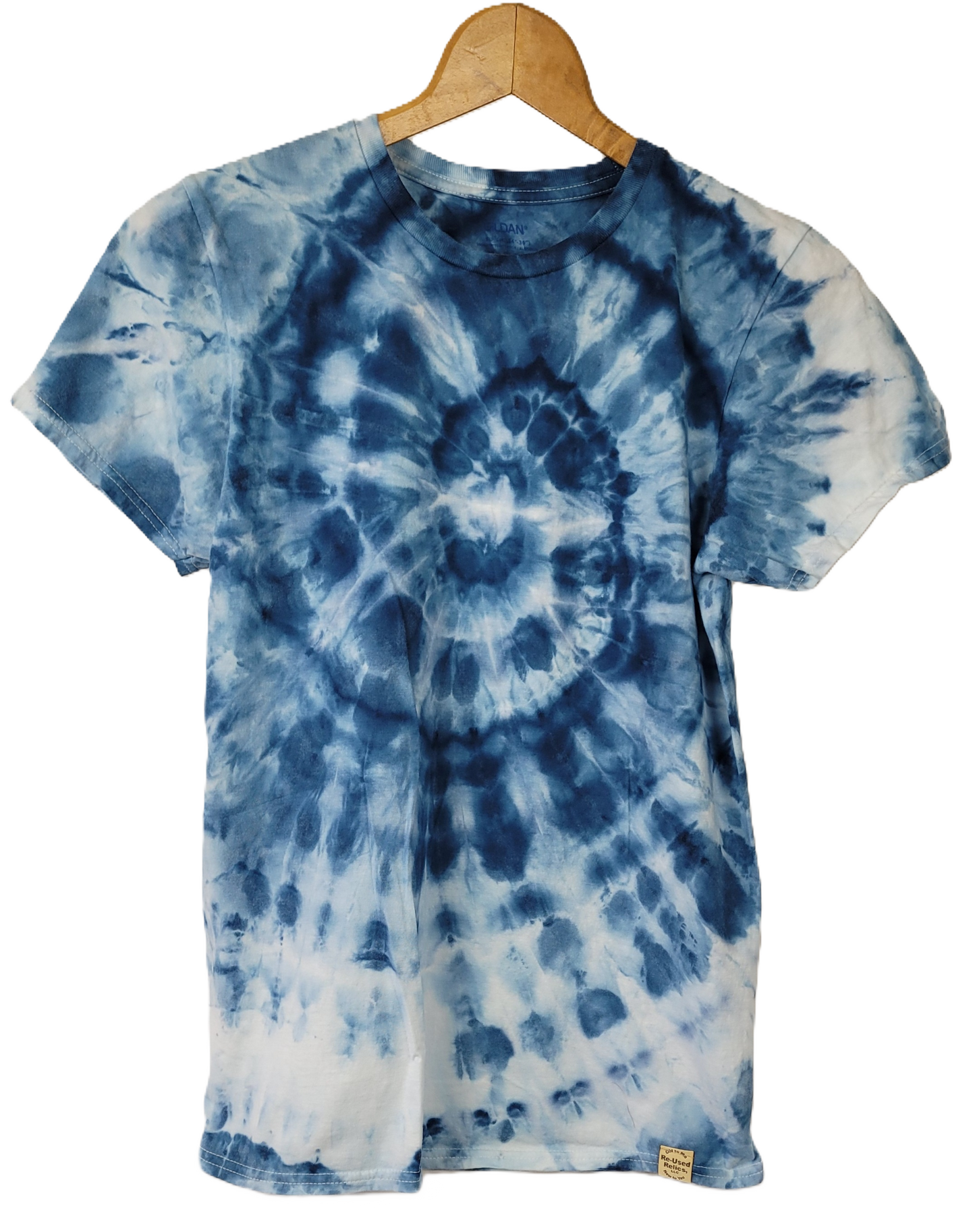 Tie-dye t-shirt with blue and white spiral pattern on a hanger against a white background