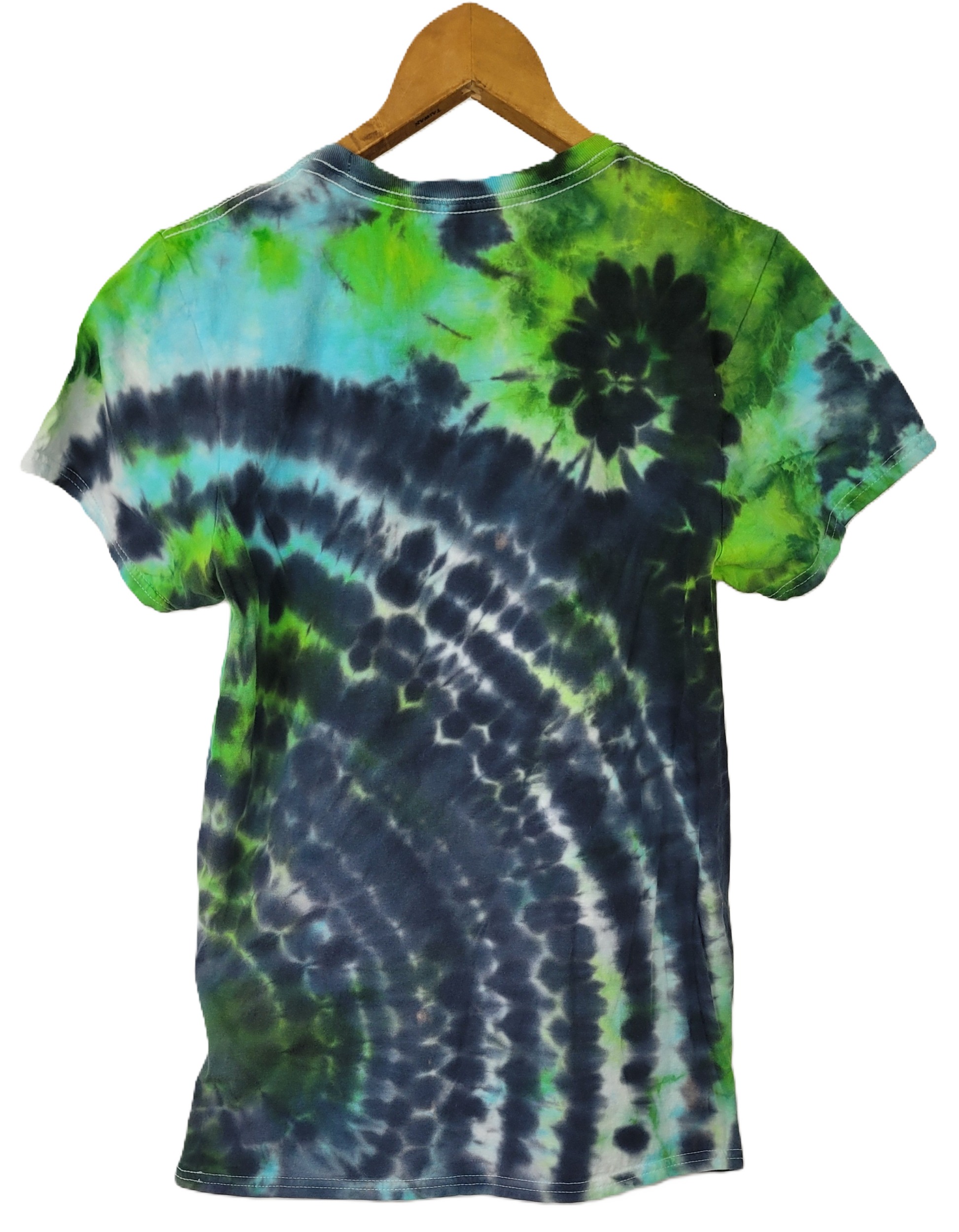 Tie-dye t-shirt with green and blue patterns on a hanger