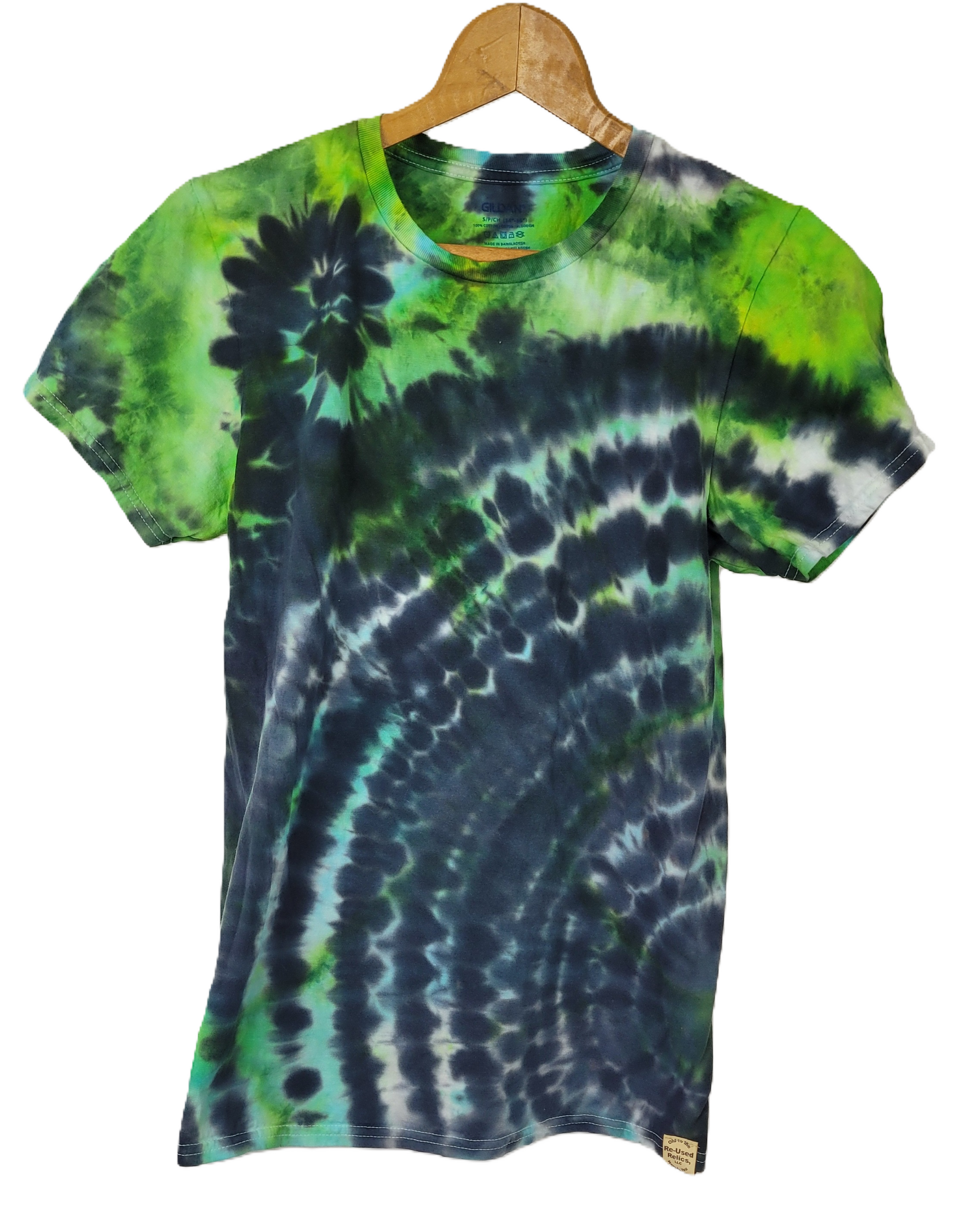 Tie-dye t-shirt with green and blue patterns on a hanger