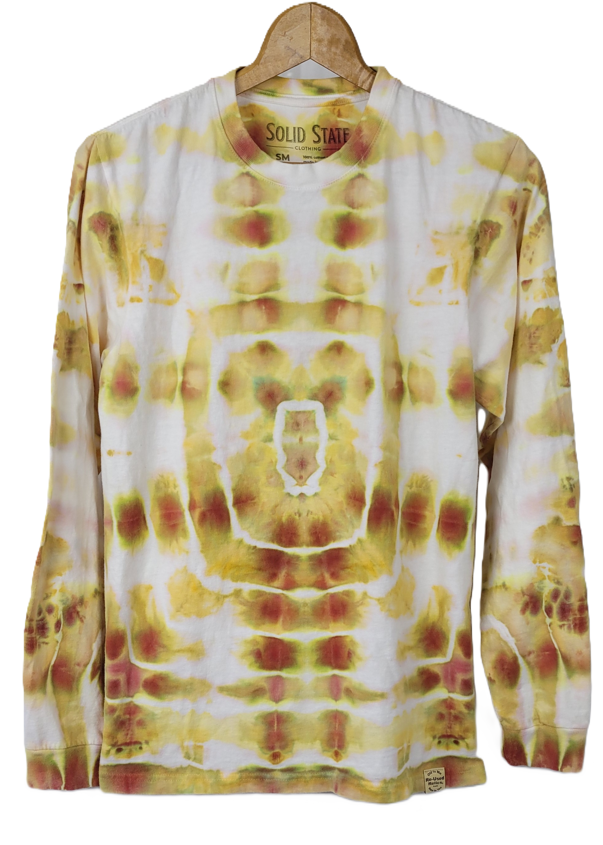 Tie-dye long-sleeve shirt with a 'Solid State' brand label on a hanger.