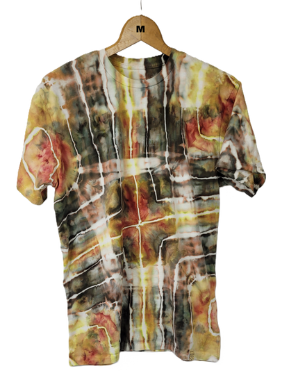 T-shirt with abstract multicolor design on a hanger