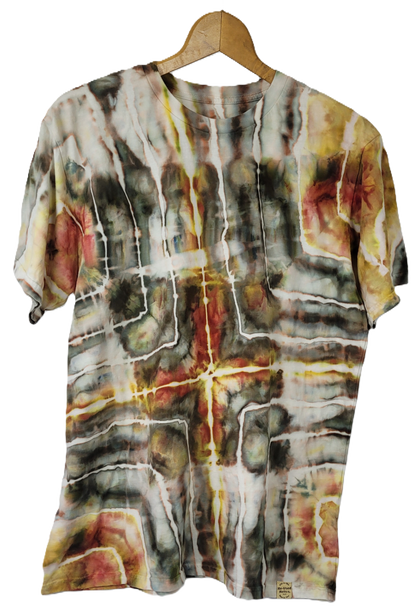 Tie-dye shirt on a hanger with abstract pattern