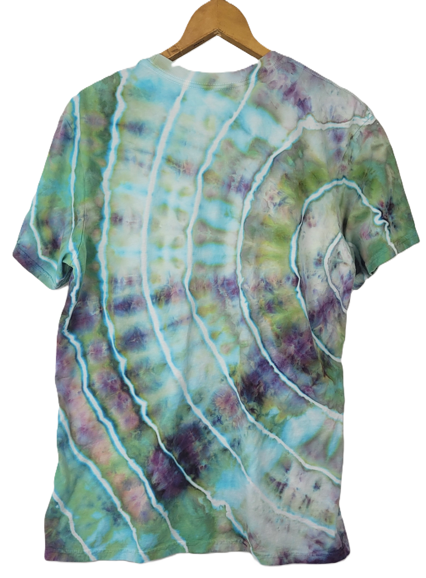 Tie-dye t-shirt with wavy pattern on a hanger